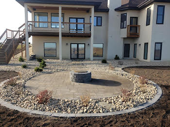 edmonton paving stone installation - paved patio in backyard