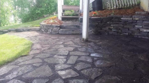 stone patio installation edmonton - brickworks landscaping- natural rock sidewalk